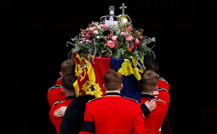 The Bearer Party takes the coffin of Queen Elizabeth II from the State Hearse into St. George's Chapel inside Windsor Castle on Sept. 19 for the Committal Service.