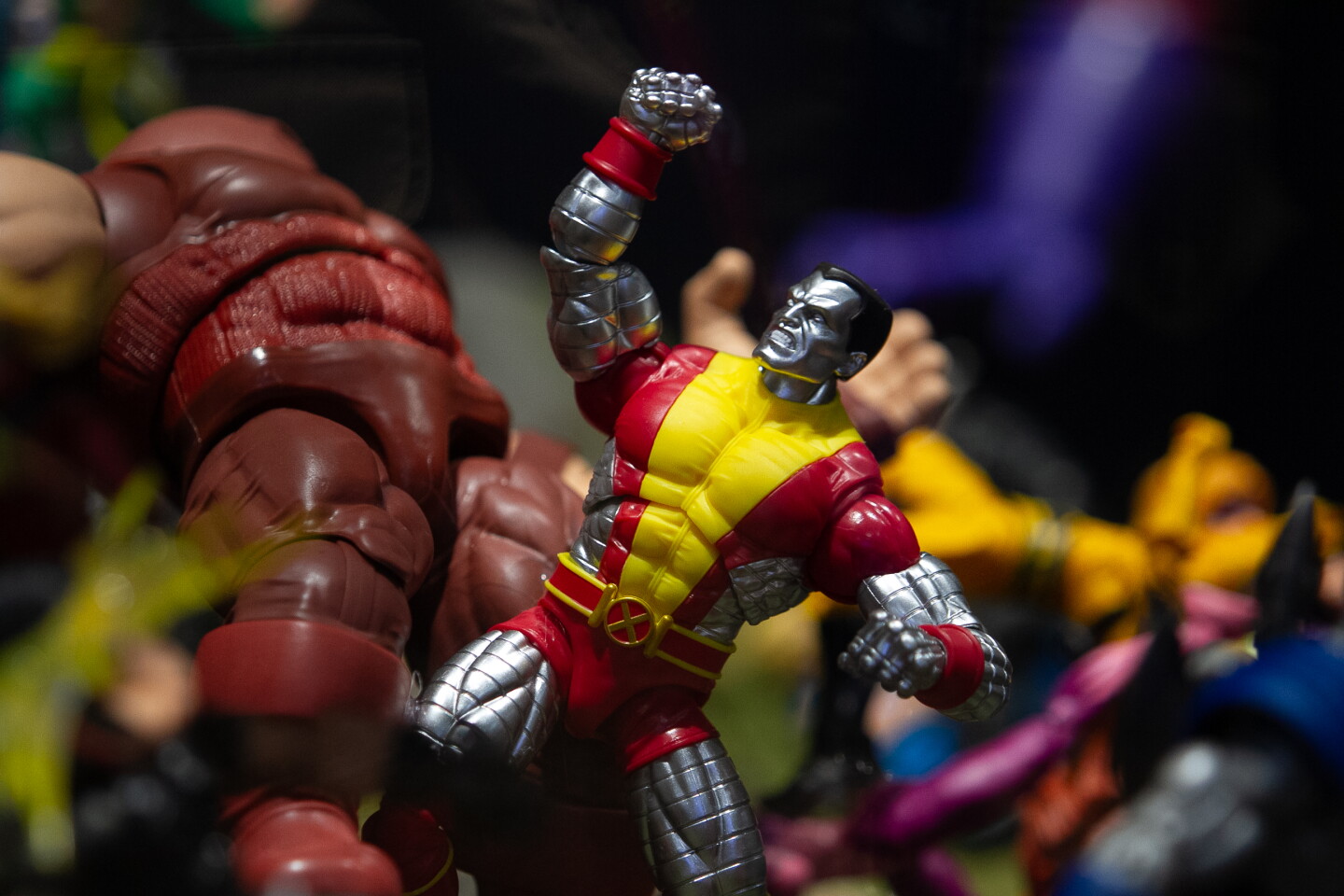 Marvel action figures are showcased in an exhibitor's display case during Comic-Con, April 23, 2026.