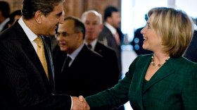 Pakistani Foreign Minister Shah Mahmood Qureshi greets U.S. Secretary of State Hillary Clinton on Wednesday at the Foreign Ministry office in Islamabad. Clinton arrived in Pakistan on a three-day goodwill mission just as a car bomb struck about 100 miles away in Peshawar, near the Afghan border.