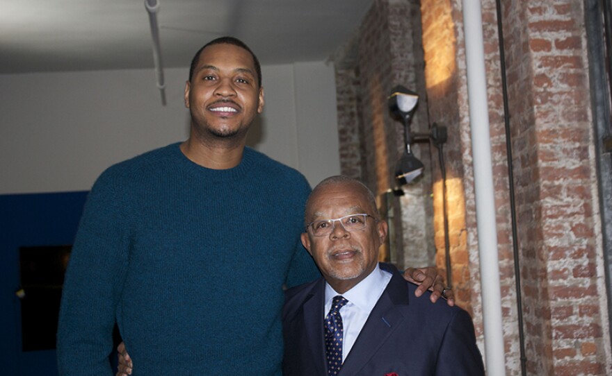 Henry Louis Gates, Jr. with Carmelo Anthony on the set of FINDING YOUR ROOTS, Season 4.