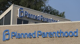 A Planned Parenthood sign is displayed on the outside of the clinic, Aug. 1, 2023, in Indianapolis.