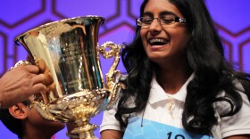 Snigdha Nandipati of San Diego, California, holds the trophy after she has won the 2012 Scripps National Spelling Bee competition May 31, 2012 at the Gaylord National Resort and Convention Center in National Harbor, Maryland.