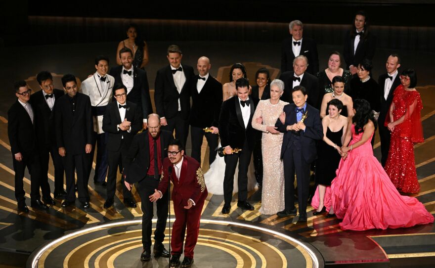 Directors Daniel Scheinert and Daniel Kwan speak after winning the Oscar for best picture for <em>Everything Everywhere All at Once.</em>