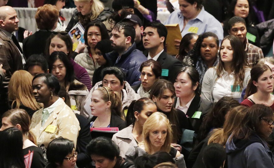 A crowd of job seekers attends a March 2013 health care job fair in New York.