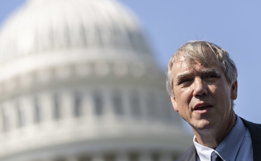 Sen. Jeff Merkley, D-Ore., thinks it's time to ban all lawmakers from trading individual stocks altogether. "It is not a popular topic among my colleagues," Merkley told NPR dryly.