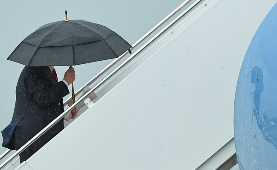President Trump boards Air Force One before departing from Morristown Municipal Airport in New Jersey over the weekend. Trump is meeting with Russian President Vladimir Putin, among other heads of state, at the G-20 summit.