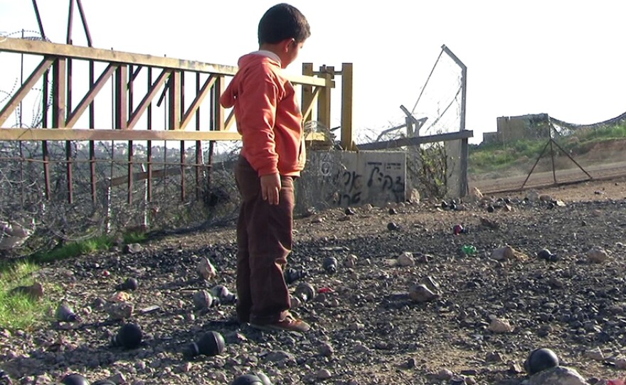 Gibreel and the remains of grenades.