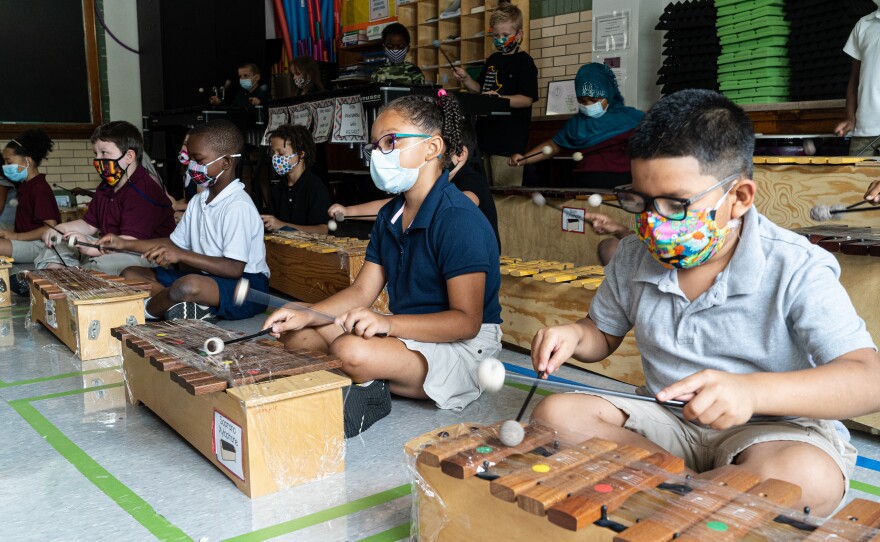 Students in Quesada's third grade music class all get the opportunity to play a xylophone. Quesada does what she can to keep the instruments clean. Her xylophones are expensive and wiping them down regularly could ruin them, so instead she spends her morning wrapping them in plastic wrap.