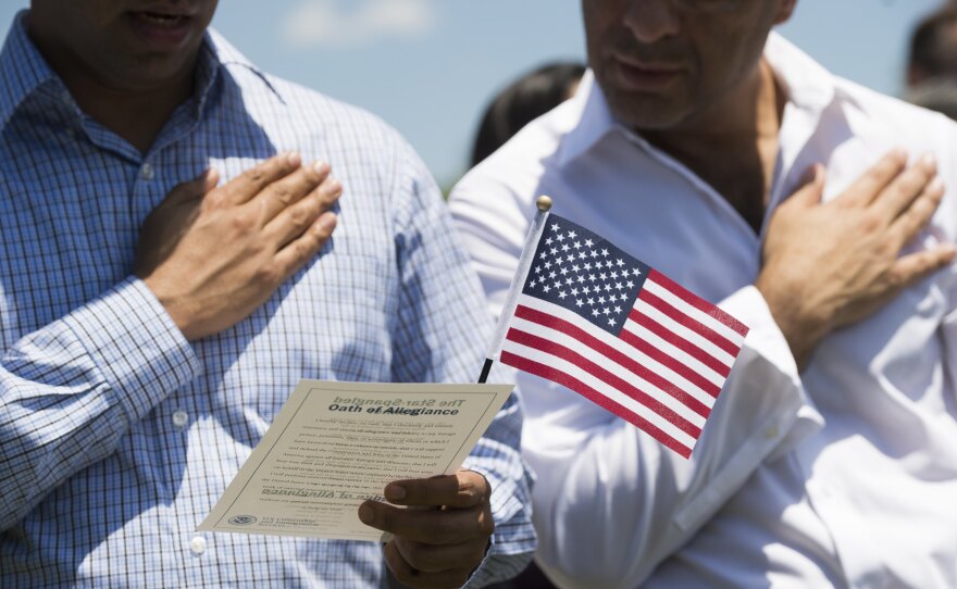 Never before has the U.S. census directly asked for the citizenship status of every person living in every household in the United States. A citizenship question that the Trump administration wants on the 2020 census could change that. Above, newly sworn-in U.S. citizens recite the Pledge of Allegiance during a naturalization ceremony at Mount Vernon in Virginia.