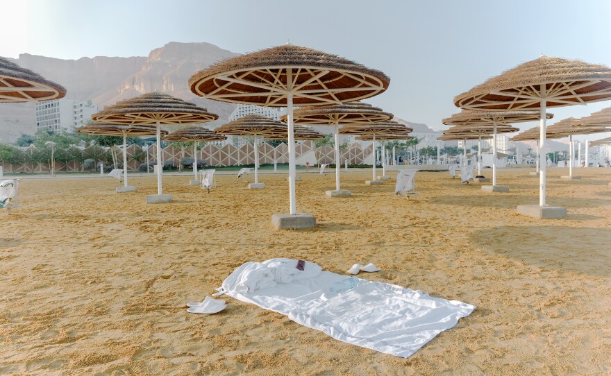A blanket along the beach of an Israeli hotel resort on the western banks of the Dead Sea on Nov. 10. Israel's Dead Sea hotels are actually built on the banks of an artificial evaporation pool of Dead Sea water maintained by the Dead Sea Works, an Israeli chemical company which extracts minerals from the lake's water.