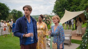 Shown L-R: Tristram Bailey (Tom Stourton), Suzie Harris (Jo Martin), Judith Potts (Samantha Bond) in MASTERPIECE: THE MARLOW MURDER CLUB, Season 2.  