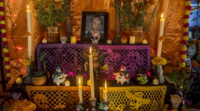This Día de Muertos altar is decorated with sugar skulls, papel picado, candles and Mexican marigold flowers at the Sherman Heights Community Center, Oct. 15, 2024.