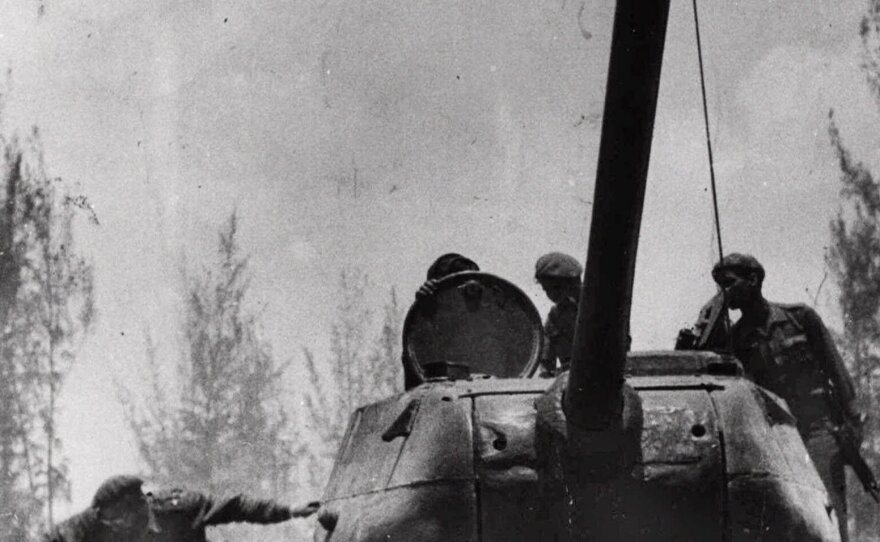 Castro's forces successfully defend the shore, capturing the invading exiles. Castro jumps from a tank at Giron, near the Bay of Pigs in April 1961.