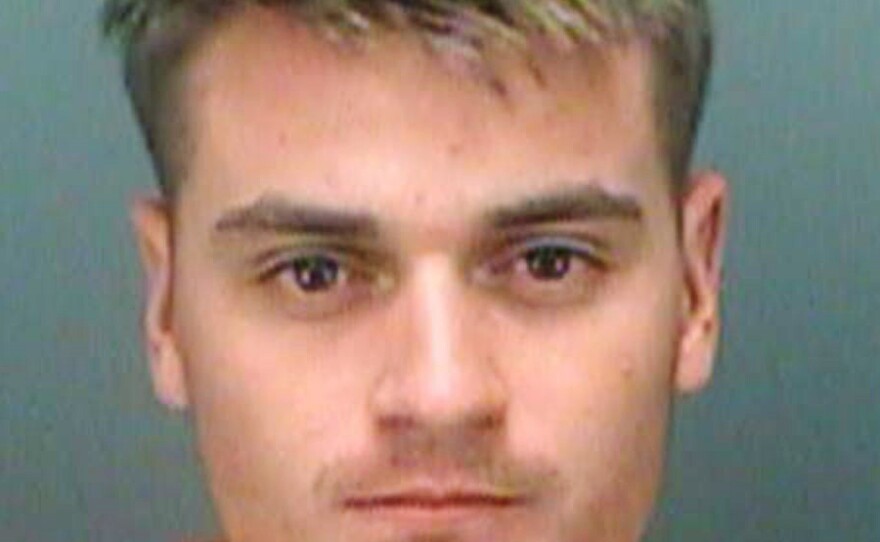 Brandon Russell, 21, a self-proclaimed neo-Nazi, was arrested after law enforcement agents found bomb-making materials in the garage of his Tampa apartment.