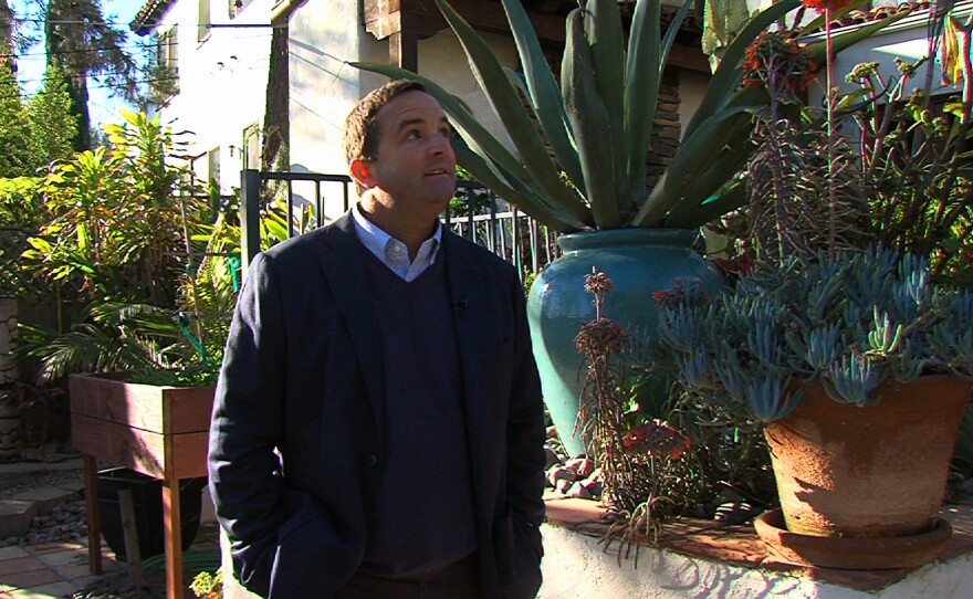 Peter Dennehy stands in the backyard of his Kensington home, Feb. 3, 2016.