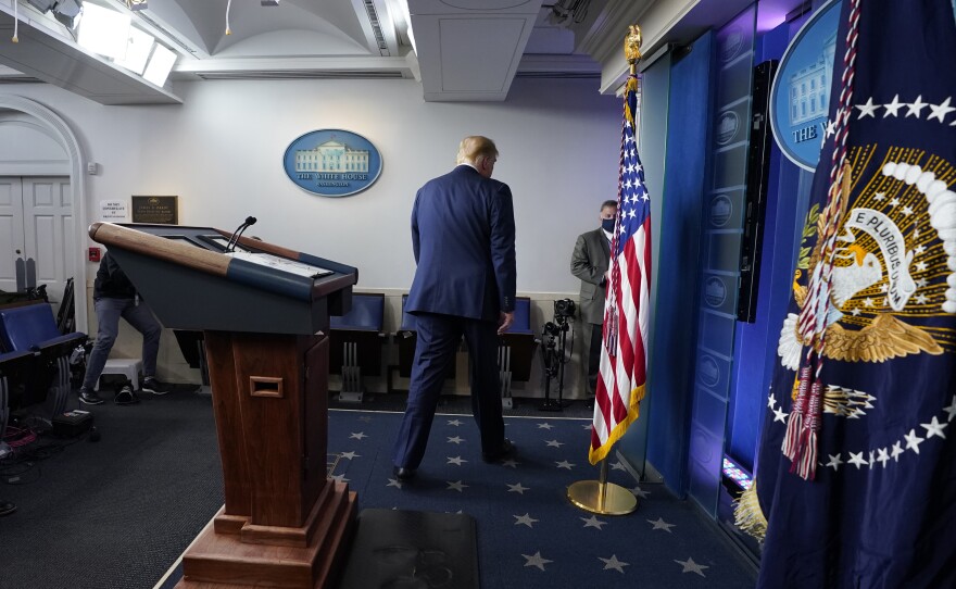 President Trump walks away after speaking at the White House on Thursday night.