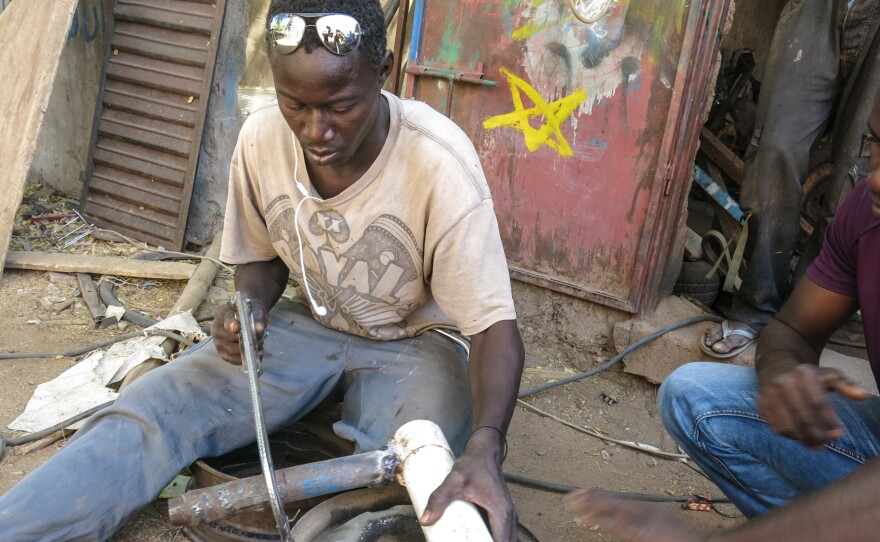 Souleymane Sebor, now a welder in Balla, eastern Senegal, was deported as an undocumented migrant from Libya. He was trying to get to Italy. Now back in Senegal, he says he won't try again without documents.