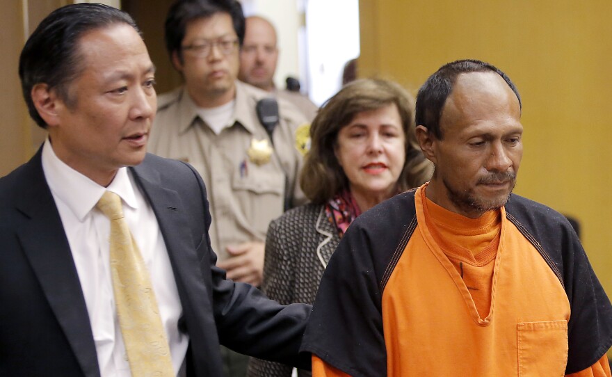 Jose Ines Garcia Zarate is led into a San Francisco courtroom by his lawyer in 2015. Garcia Zarate faces a new federal warrant and deportation.