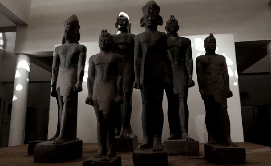 Nubian Pharaohs pictured are reassembled statues of Pharaoh Taharqa (largest) and Pharaoh Aspelta (smallest). These statues were originally beheaded by Egyptian conquerors who tried to erase the Kush and the 25th Dynasty from history.