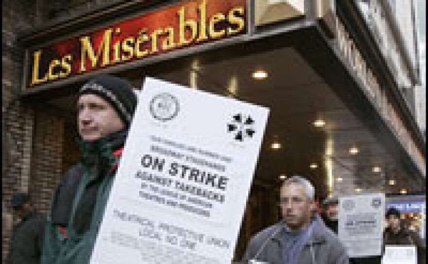 Broadway stagehands walk a picket line Nov. 10, 2007, in front of the Broadhurst Theater in New York.