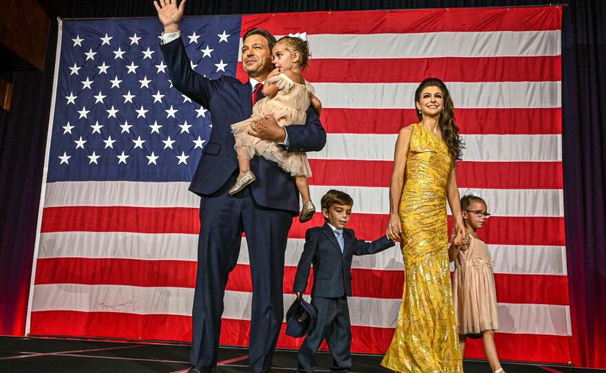 Florida Gov. Ron DeSantis, with his wife Casey and children Madison, Mason and Mamie, waves to the crowd during a midterm election night watch party on Nov. 8, 2022.