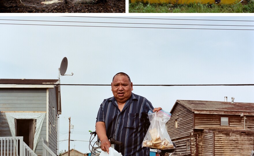 Left: Mary Ruth Meyook and Nellie Arey pull in fish nets at Shingle Point, a fishing camp in Canada. Right: Beluga whale drying outside of Billy Archie and Kathy Greenland's home. The day before, whalers in Aklavik caught six beluga whales in the river. Bottom: Sandy Elaine shows the dried beluga he just picked up from Archie and Greenland.