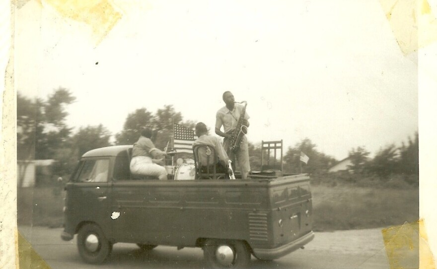 Musicians play on a truck bed at Lake Ivanhoe.