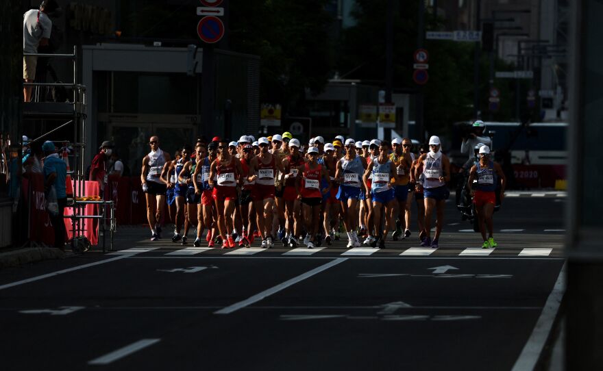 Athletes compete in the men's 20km race walk final on August 5.