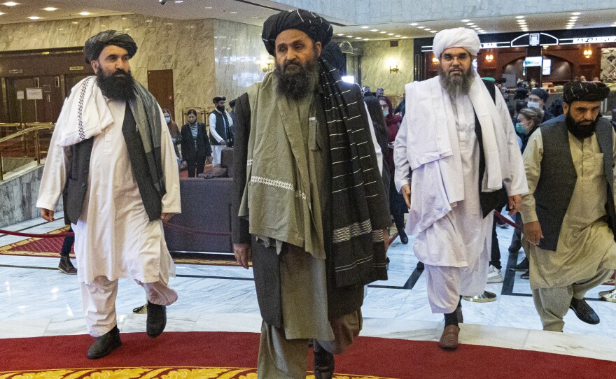 Taliban co-founder Mullah Abdul Ghani Baradar (center) arrives with other members of the Taliban delegation for an international peace conference in Moscow in March. A delegation of the Taliban visited Moscow in July to offer assurances that their quick gains in Afghanistan don't threaten Russia or its allies in Central Asia.