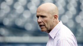 San Diego Padres president Mike Dee on the field before a baseball game against the Seattle Mariners in San Diego, June 1, 2016. 