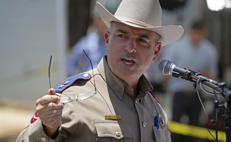 Victor Escalon, Regional Director of the Texas Department of Public Safety South, speaks to the press during a news conference outside of Robb Elementary School in Uvalde, Texas, Thursday, May 26, 2022.