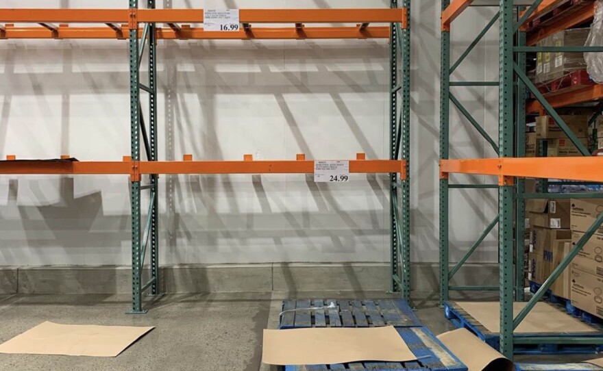 Empty shelves at the Moreno Plaza Costco in Bay Ho on March 2, 2020, as shoppers clear the store of household necessities, such as toilet paper, because of the coronavirus panic.