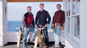 Rhode Island general contractor Andy Tiplady, host Kevin O'Connor and master carpenter Norm Abram at the Barrington, Rhode Island, beach house, a 1925 modified Cape that boasts spectacular views of scenic Narragansett Bay.
