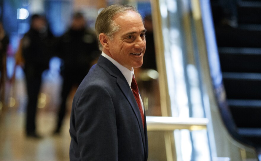 David Shulkin, at the time the Veterans Affairs undersecretary for health, leaves a meeting with then President-elect Donald Trump at Trump Tower in New York.