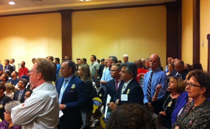 The crowd inside the meeting to determine the convention center expansion.