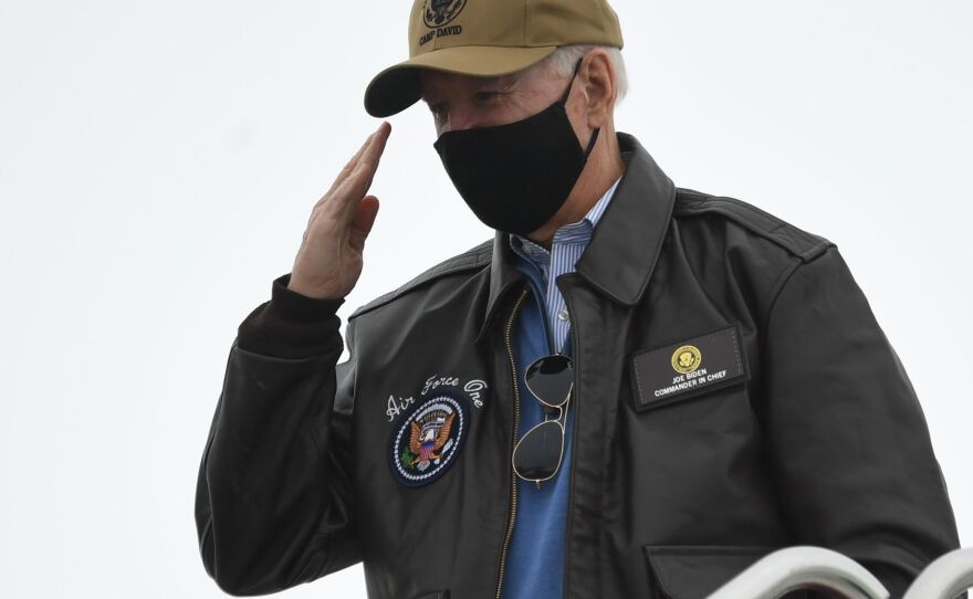 US President Joe Biden boards Air Force One prior to departure from Hagerstown Regional Airport in Hagerstown, Maryland, February 15, 2021