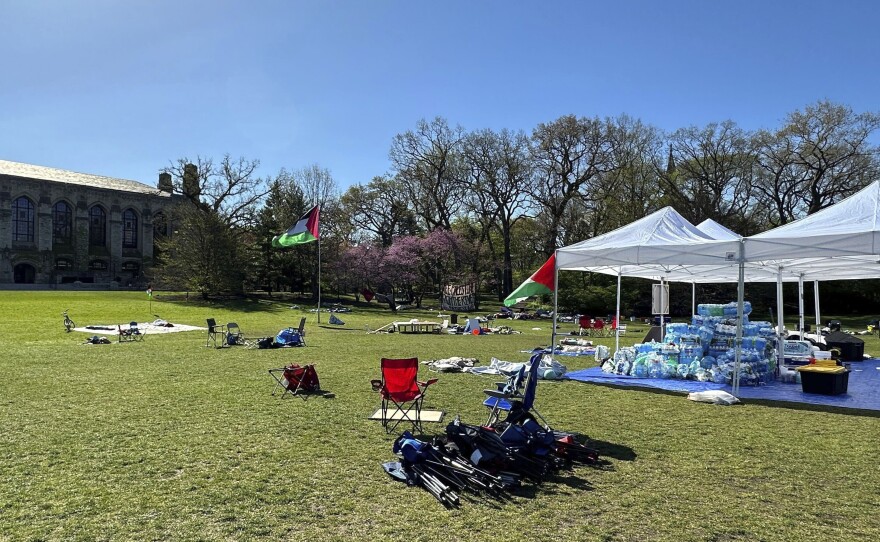 Tents, flags and other supplies remain at Deering Meadow on Northwestern University's campus in Evanston, Ill. on Tuesday a day after the university and protest organizers announced an agreement which largely ended anti-war demonstrations that have lasted days.