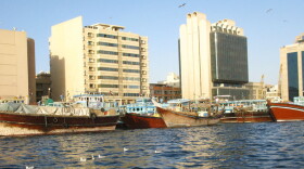 Wooden boats known as dhows are used in trade between Dubai and Iran. The emirate has long been an economic lifeline for Iran, despite U.N., U.S. and EU sanctions against Tehran's nuclear program. But new financial restrictions imposed on Dubai by the United Arab Emirates' capital, Abu Dhabi, have made Iran-Dubai trade more difficult.