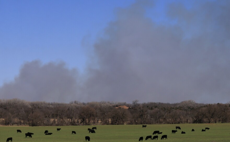 Fires near Hutchinson, Kan., have sent smoke billowing across miles of farmland.