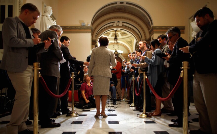 House Minority Leader Rep. Nancy Pelosi talks to reporters in the U.S. Capitol on Friday. Pelosi was critical of Speaker John Boehner and the GOP leadership for recessing the House without passing extensions of the payroll tax cut and unemployment benefits, both set to expire at the end of the year.