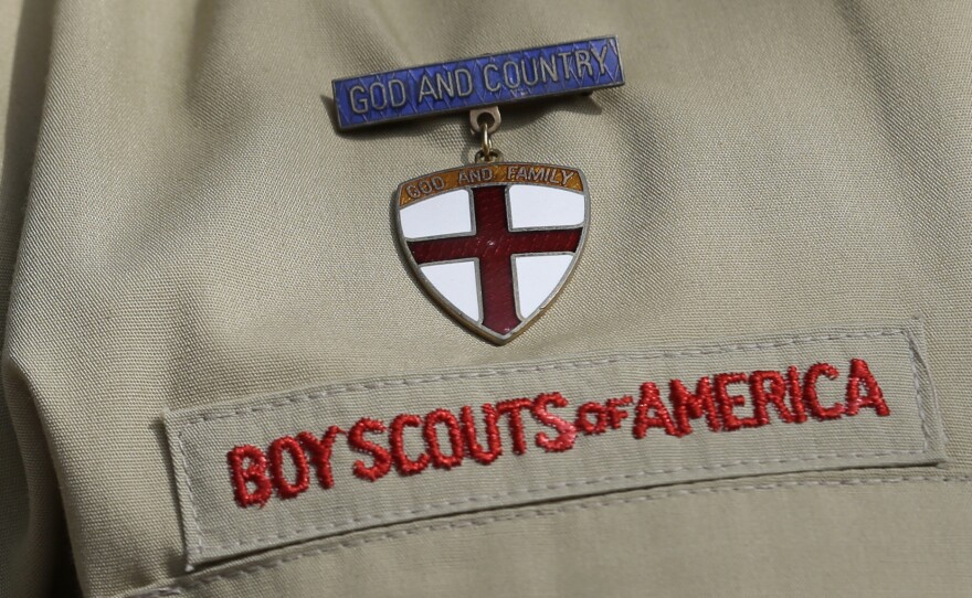 A close up detail of a Boy Scout uniform. The organization has been exploring expanding its programming to girls.