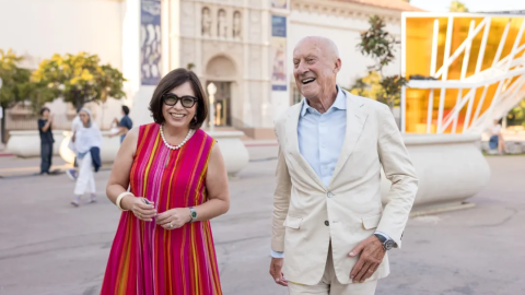 San Diego Museum of Art executive director and CEO Roxana Velásquez (left) walks alongside architect and Foster+Partners founder Norman Foster in Balboa Park, Sept. 9, 2024.