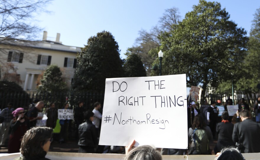 Protestors rally against then-Virginia Governor Ralph Northam outside of the governor's mansion in Richmond, Va., on Feb. 4, 2019.