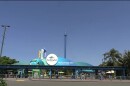 Guests in front of the SeaWorld San Diego entrance, Sept. 7, 2023.