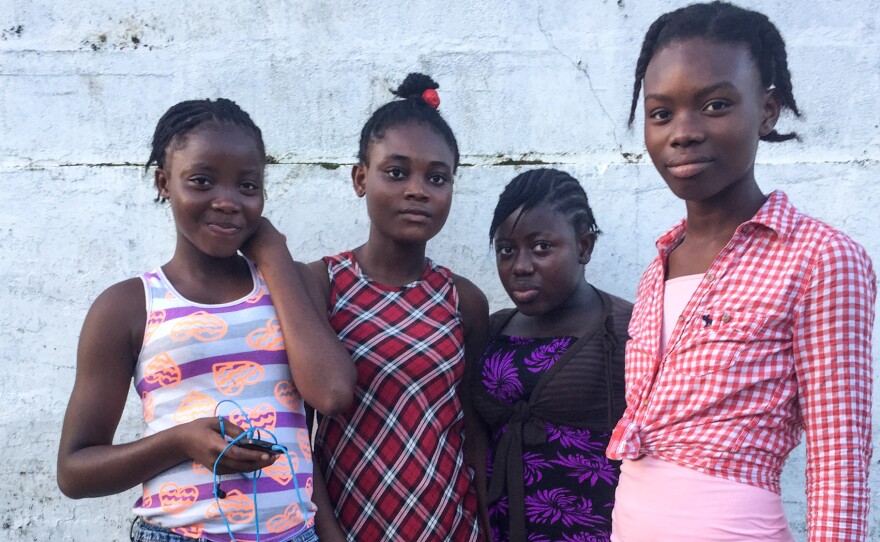 These Liberian 15-year-olds share their wishes for the first lady's visit. From left: Doris S. Diggs, Diana Kudjoe, Akosua Amartey and Massa David.