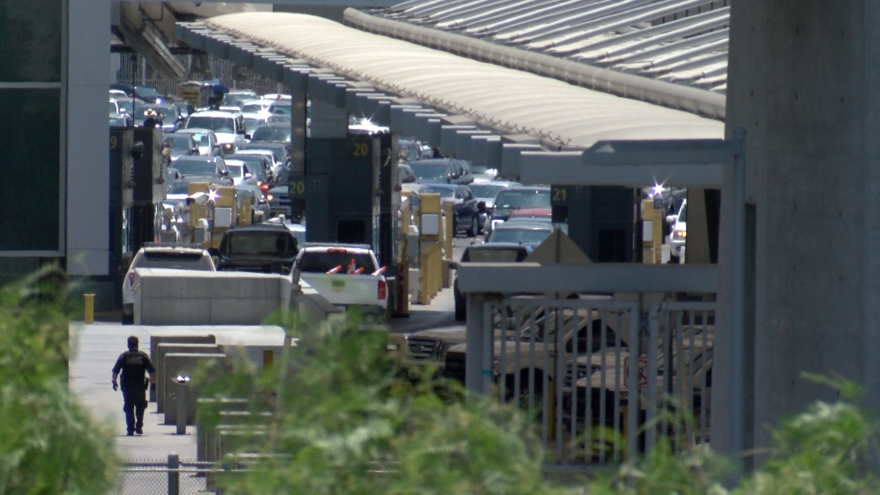 Cars wait in line to cross the San Ysidro border to San Diego, Aug. 3, 2018.