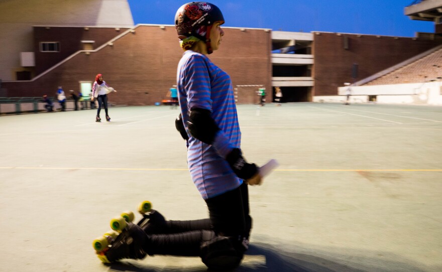 Nouran El-Qabbany, 27, a graphic designer, demonstrates safety measures to new players. "If you must fall, and you will fall, you should try to fall to the front not the back," she says.