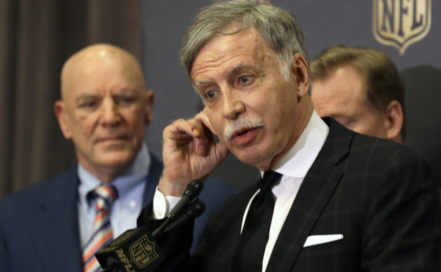 St. Louis Rams owner Stan Kroenke, seen here speaking to the media after NFL owners approved the Rams' move to a new stadium just outside Los Angeles, is the target of anger for many NFL fans in St. Louis today.