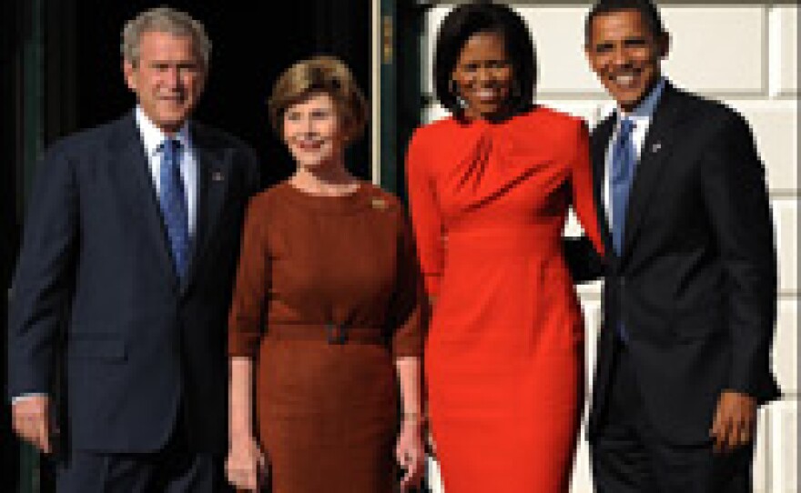From left: President George W. Bush, First Lady Laura Bush, Michelle Obama and President-elect Barack Obama stand outside the diplomatic entrance of the White House, Nov. 10, 2008.