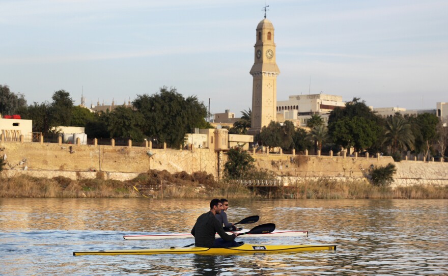 Young members of the Baghdad Rowing Club practice on the river Tigris, close to Mustansariya University in the Iraqi capital.
